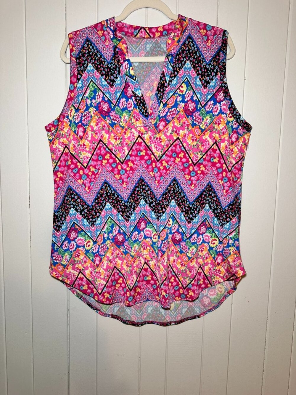 Dear Scarlett sleeveless split neck top, a vibrant pink, blue, & blk chevron